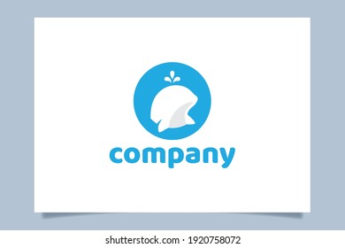 a cute beluga whale logo vector graphic with a beluga appears on the surface of water.