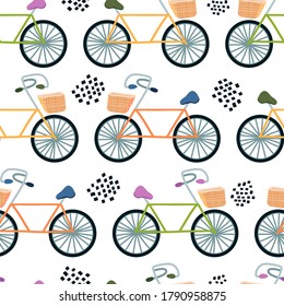 Bicicletas con cestas de mimbre. Patrón sin fisuras de vectores en estilo plano. fondo para imprimir en papel, tela, ropa. Bicicletas de diferentes colores sobre un fondo interminable para el diseño y la impresión.