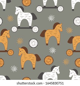 
Cute birchbark horses , log slice and the sun. Seamless vector pattern. Nursery design.Toys horses on on a gray background.