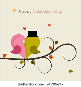 Cute bird couple in love sitting on branch of tree for Happy Valentines Day celebration.