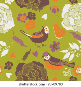 Cute birds in a fruit garden