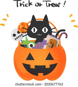 Cute black cat and candy in a jack-o-lantern basket