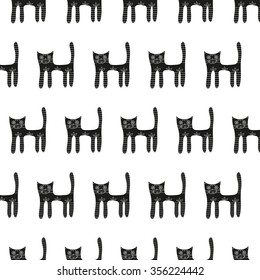 Cute black cat seamless pattern on a white background. Vector illustration