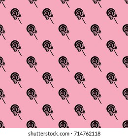 Cute black lollipop seamless pattern in pink background and design with punk style. 