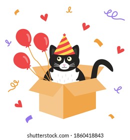 Cute black and white cat sitting in a cardboard box in a multi-colored cap with red balloons. Happy birthday greeting card. Doodle vector illustration.