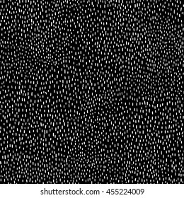 Cute black and white pattern. The white dots on a black background. Seamless vector illustration.