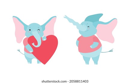 Cute Blue Elephant with Trunk Trumping and Holding Heart Vector Set