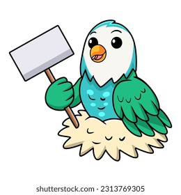 Cute blue turquoise bird cartoon holding blank sign