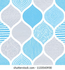 Cute blue and white pattern. Summer print for textiles. Wavy ornament drawn by hand. Vector illustration.