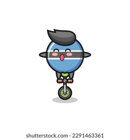 The cute botswana flag badge character is riding a circus bike , cute style design for t shirt, sticker, logo element
