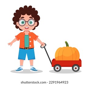 Cute boy with a big pumpkin, getting ready for halloween
