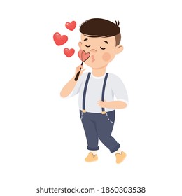 Cute Boy Blowing Soap Bubbles in Shape of Hearts, Adorable Child Character with Romance Feelings Symbols, Happy Valentines Day Cartoon Vector Illustration