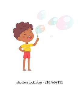 Cute boy blowing soapy bubbles vector illustration. Cartoon isolated funny kid holding blower maker stick in hand to blow clear balloons from soap liquid, adorable little child standing and playing