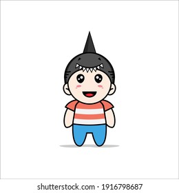 Cute boy character wearing shark costume. Mascot design concept