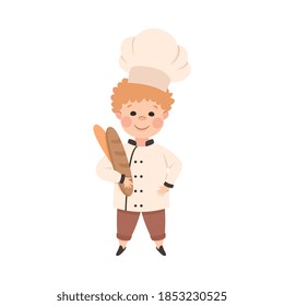 Cute Boy Chef Cook Holding Fresh Baked Loaf of Bread, Kid in Chef Uniform Cooking in Kitchen Cartoon Style Vector Illustration