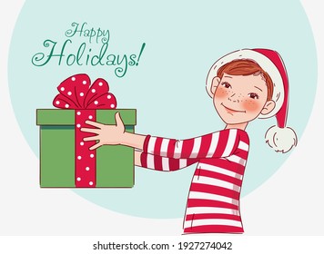 Cute boy with Christmas Present