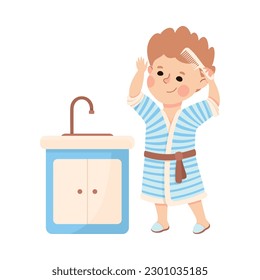 Cute boy combing his hair. Happy kid doing everyday hygiene activities cartoon vector illustration