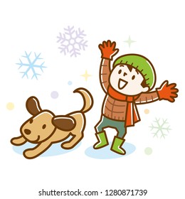Cute boy and dog playing in snow