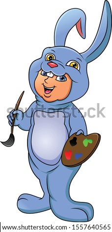 Cute boy dressed in costume rabbit
