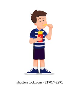 a cute boy eating french fries