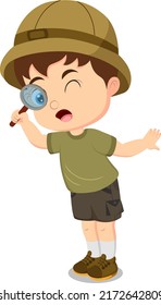 Cute boy explorer using a magnifying glass