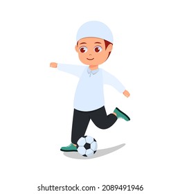 Cute boy getting ready to do a ball kick