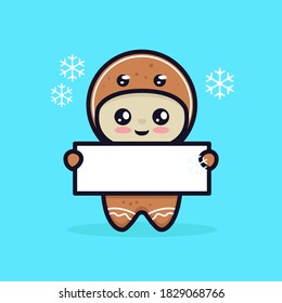 Cute boy with gingerbread Christmas holding invitation banner