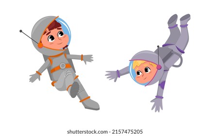 Astronautas de niños y niñas en trajes espaciales flotando en el espacio ultraterrestre caricatura ilustración vectorial