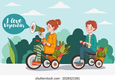 Cute boy and girl with fresh vegetables rides on bicycle in the garden. Funny girl shouting on the megaphone. Summer time