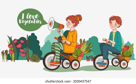 Cute boy and girl with fresh vegetables rides on bicycle in the garden. Funny girl shouting on the megaphone. Summer time