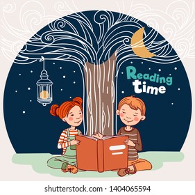 Cute boy and girl reading a book under the tree