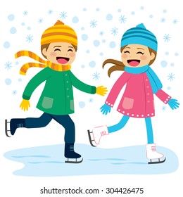 Cute boy and girl wearing warm winter clothes ice skating together on frozen lake