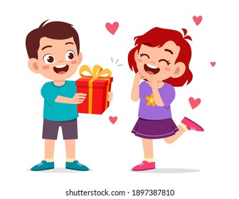 cute boy give present to little girl for celebrate birthday