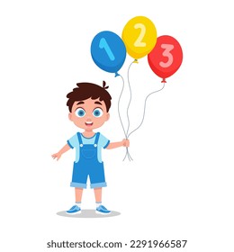 Cute boy holding number balloons