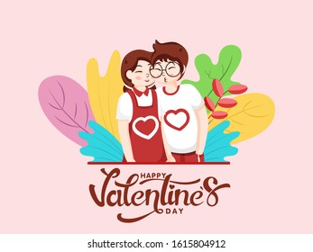 Cute Boy Kissing his Girlfriend on Colorful Leaves with Pastel Pink Background for Happy Valentine's Day Celebration.