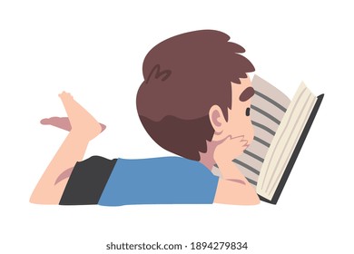 Cute Boy Lying on Floor and Reading Book, Kid Enjoying of Literature, Elementary School Student Character Cartoon Style Vector Illustration