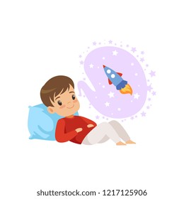 Cute boy lying on a pillow and dreaming about rocket, kids imagination and fantasy concept, vector Illustration on a white background