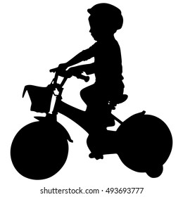 cute boy on a bicycle