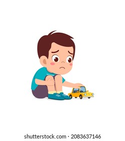 cute boy play toy car alone and feel sad