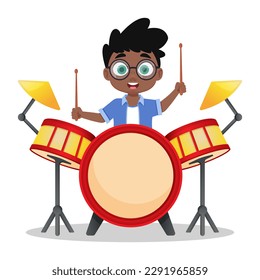 Cute boy playing drums, child playing a musical instrument