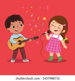 Cute boy playing guitar and little girl singing on red background