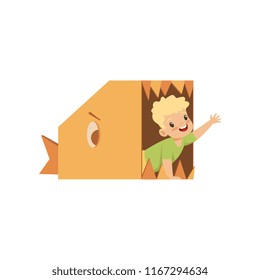 Cute boy playing inside a toothy fish made of cardboard boxes vector Illustration on a white background