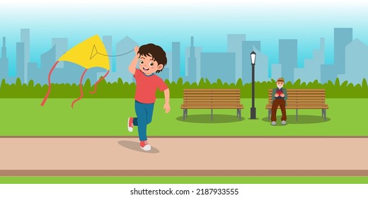 Cute Boy Playing Kites in City Park with His Father
