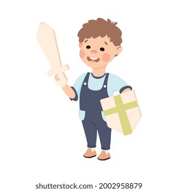 Cute Boy Playing Knight Holding Paper Shield and Wooden Sword, Adorable Kid Leisure Activity Concept Cartoon Vector Illustration