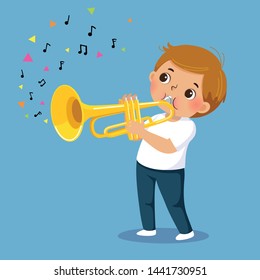 Cute boy playing the trumpet on blue background