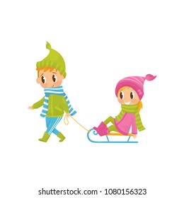 Cute boy pulling little girl on sledge. Outdoor activity. Cheerful brother and sister in warm winter outfit. Flat vector design