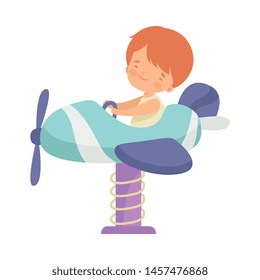 Cute Boy Boy Riding Spring Airplane See Saw, Happy Kid Having Fun in Amusement Park Vector Illustration