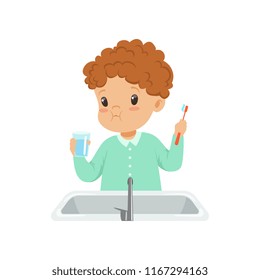 Cute boy rinsing his teeth with water, kid brushing and caring for teeth in bathroom vector Illustration on a white background