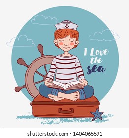 Cute boy sitting on a suitcase and reading a book. Travel and adventure concept 