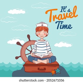 Cute boy sitting on a suitcase and reading a book. Travel and adventure concept 